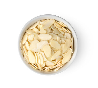 Bowl of almond slices isolated on white background