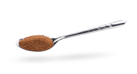 Brown Teff Grain in spoon on white background