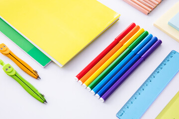 Obraz premium collection of bright colorful stationery on light background, close view . High quality photo
