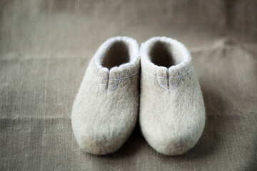 Slippers made of wool,embroidered by the method of felting