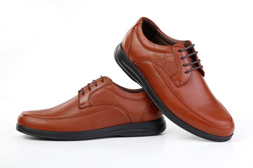 Classic brown leather shoes on a white background