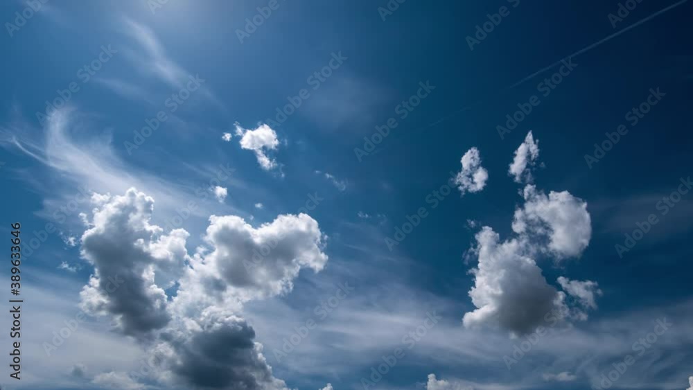 Wall mural time lapse of white clouds on a sky