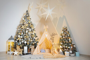 Playroom for children with Christmas decorations, gifts, tent and Christmas trees © pridannikov