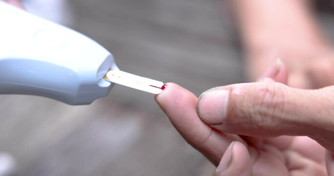 Diabetes, Men are taking blood samples to measure glucose levels.
