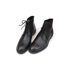 Fashionable black boots for men and women isolated on white background