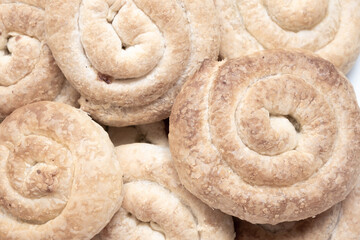 Sweet cinnamon rolls on table