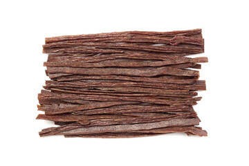 Dried beef meat sliced on stick, beer snack isolated on white background