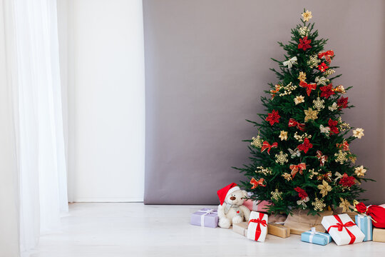 Christmas tree decor with gifts for the new year interior