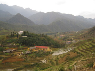 Obraz premium The beautiful rice fields and terraces in the mountains of Sa Pa in Northern Vietnam, Asia