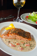 Pan roasted Cajun seasoned salmon fillet. Served with rice pilaf, organic steamed vegetables, bell peppers, squash, carrots and zucchini. Classic American diner lunch favorite.