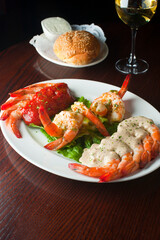 Grilled shrimp platter. Shrimp scampi sautéed in olive oil, garlic, Italian parsley & served with cocktail sauce and lemons. Classic Italian, American restaurant or French bistro entree or appetizer.
