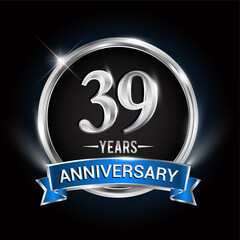 Celebrating 39th years anniversary logo with silver ring and blue ribbon.