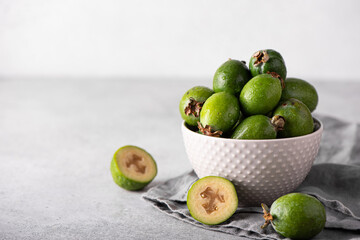 ripe large feijoa in a gray bowl