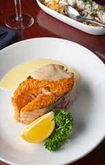 Pan roasted Cajun seasoned salmon fillet. Served with rice pilaf, organic steamed vegetables, bell peppers, squash, carrots and zucchini. Classic American diner lunch favorite.