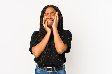 Young african american woman isolated on white background whining and crying disconsolately.