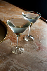 Old Fashioned Cocktail. Traditional American craft cocktails made by artisanal bartenders or mixologists in speakeasy & upscale bars or dive bar taverns. Cocktails served in chilled cocktail glass.