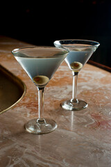 Old Fashioned Cocktail. Traditional American craft cocktails made by artisanal bartenders or mixologists in speakeasy & upscale bars or dive bar taverns. Cocktails served in chilled cocktail glass.