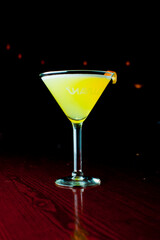 Cocktails. Traditional American drinks made by artisanal bartenders or mixologists in speakeasy & upscale bars or dives or taverns.Cocktails served in chilled cocktail glasses & garnished with fruit.