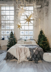 Beautiful cozy bedroom with winter style interior