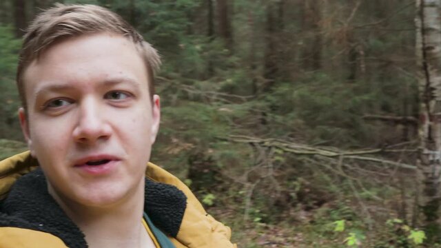 video blogger wild traveler in the woods explore nature storytelling