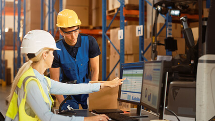 In Retail Warehouse Manager Uses Computer with Inventory Checking Software, Talks with Storehouse Worker about Package Delivery. International Distribution Center with Shelves Full of Products 