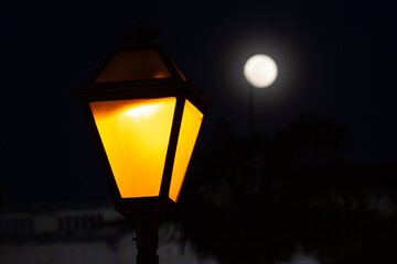 full moon with light pole