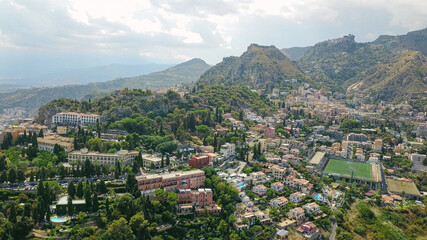 Fototapeta na wymiar View over the city of Taormina, Italy, houses on the hills