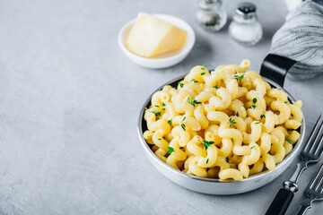 American mac and cheese, macaroni and cheese pasta in pan