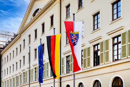 Facade with flags in front of Hessischer Landtag (Hessian state parliment) in Wiebaden
