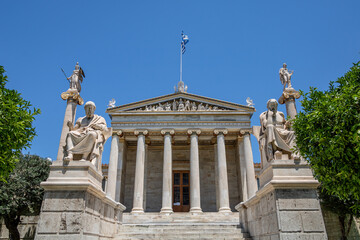 Fototapeta na wymiar The Academy of Athens, statue of Plato and Socrates, Athena and Apollo
