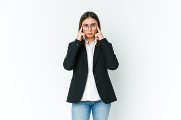 Fototapeta premium Young caucasian business woman focused on a task, keeping forefingers pointing head.