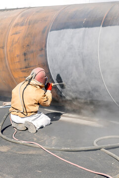 Sandblasting (abrasive Blasting). Equipment Typically Consists Of A Chamber In Which Sand And Air Are Mixed. The Mixture Travels Through A Hand-held Nozzle To Direct The Particles Toward The Surface.