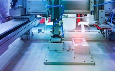Industrial technology using robots mechanical arm the mobile phone  box in the factory