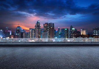 Empty floor platform with night view city skyline background © Image Craft