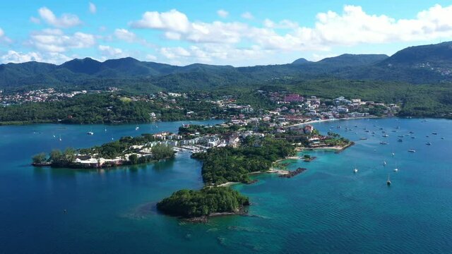 Aerial view over la pointe du bout Martinique leisure boats and hotels on the coastline sunny day 