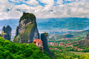 Temple Meteora Greece. Spectacular summer panoramic landscape of UNESCO heritage list object. Scenic view at the orthodox monastery at the summit of steep rock in Greece.