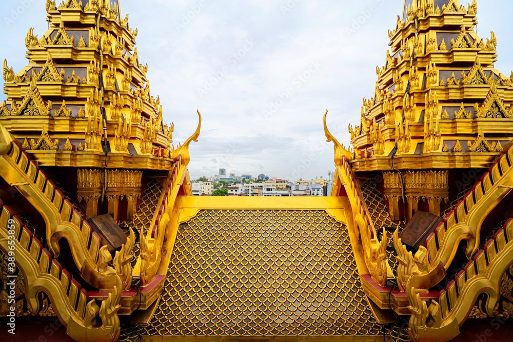 Wall mural Metal castle with roofs made of metal in Wat Ratchanatda(Temple in Bangkok, Thailand)