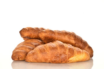 Fragrant homemade croissant, close-up, on a white background.