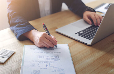 Close-up view of businessman to sign a project on desk