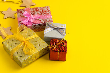 gift box with ribbon on yellow background