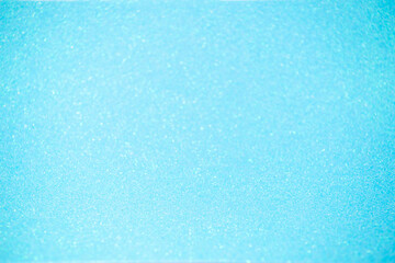 Abstract blue glitter background. Shiny glitter bokeh christmas background.