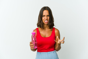 Young latin woman holding a milkshake isolated on white background