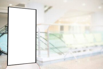 Billboard installed beside the escalator area, white billboard background