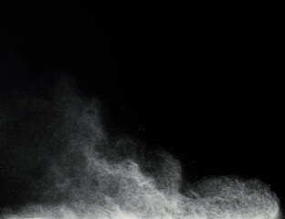 Powder in ascending movement floating in the air
