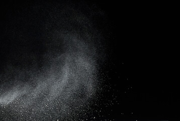 Powder in ascending movement floating in the air