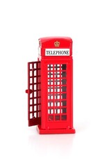 The famous English Red telephone box. Miniature layout isolated on a white background