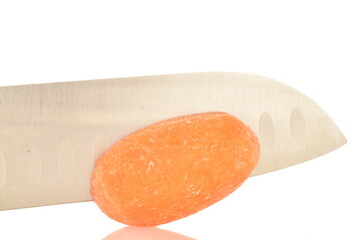 Ripe juicy organic mini carrots, close-up, on a white background.