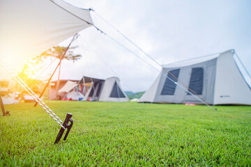 Close up of tent peg anchor on the ground tent,hook of tent,camping