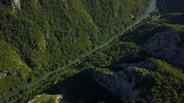 Aerial flight over limestone canyon of Vrbas river in Bosnia.
