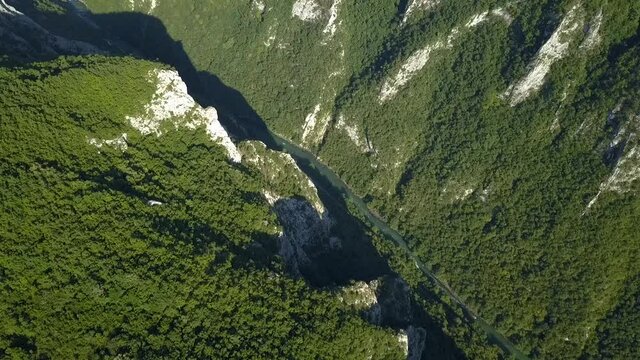 Aerial flight over limestone canyon of Vrbas river in Bosnia.